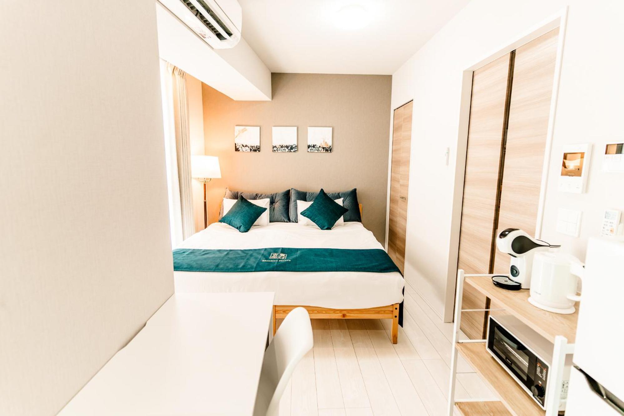 Shinkou House Ue Apartman Oszaka Szoba fotó